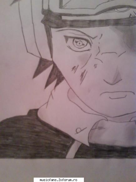 acesta este obito din animeul naruto...a fost in copilarie membru in echipa cu kakashi si rin